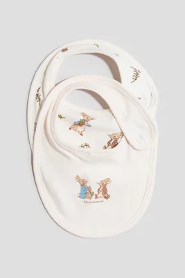 2-pack printed cotton jersey bibs - Cream/peter Rabbit