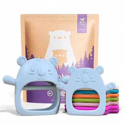 Infatotยฎ Teething Toys for Baby Gifts โ 2-Pack Koda Koala Teether Mitten Glove, Soothing Hand Teethers for Infants, Baby Toys 0-6 Months and Up, Newborn Essentials for Teething Relief, Orange. - Koala Baby Blue